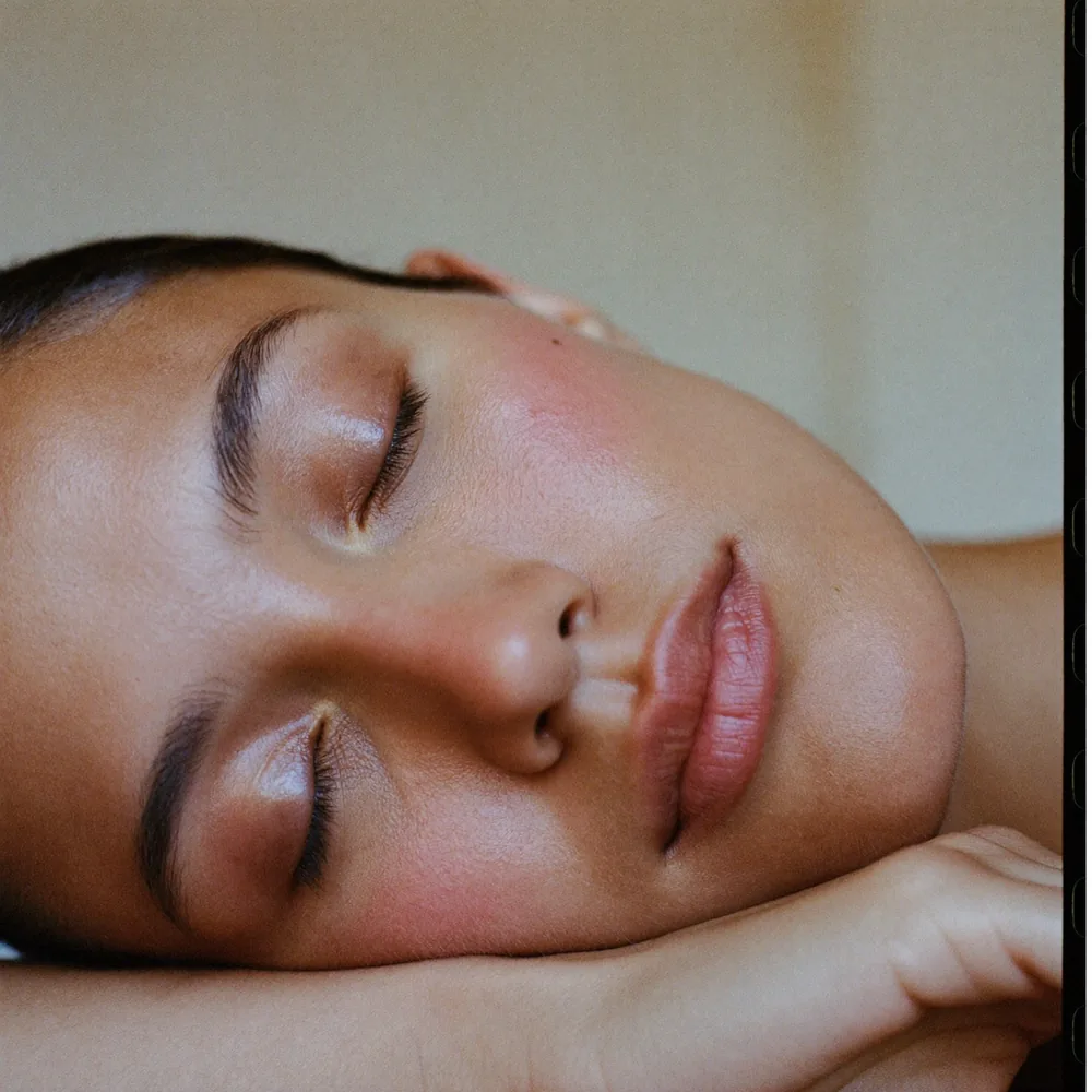 Close up of a client resting with her eyes closed